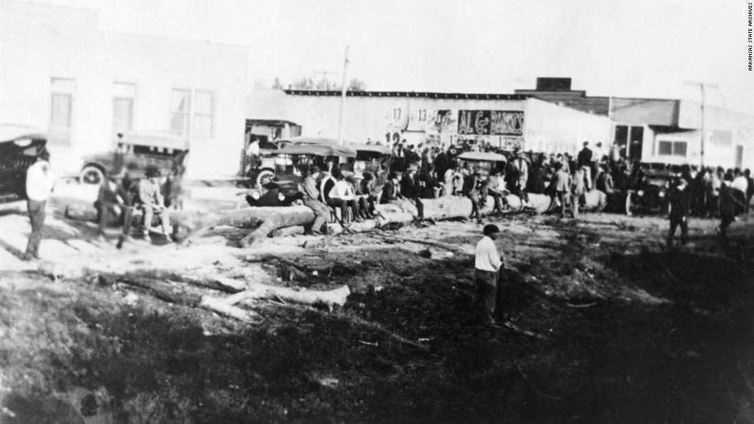 black and white image of a crowd on Elaine Arkansas's main street.