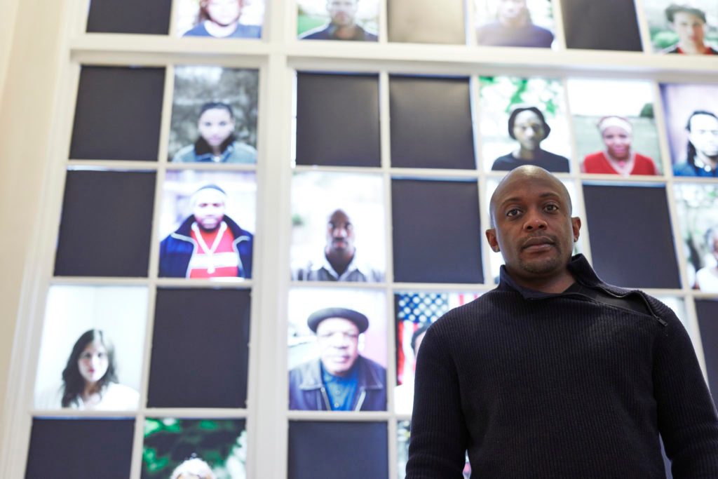 Hank Willis Thomas at his survey at the Portland Art Museum. Courtesy of the Portland Art Museum.