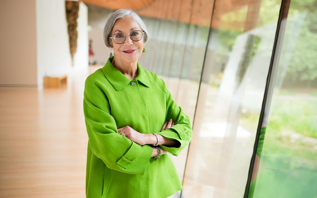 Image of Alice Walton posed in the modern art gallery