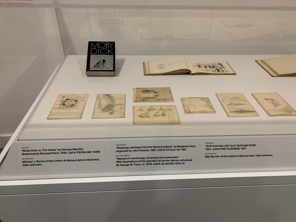 image of a kiosk of rare books inspired by In American Waters; found in the Crystal Bridges Library collection
