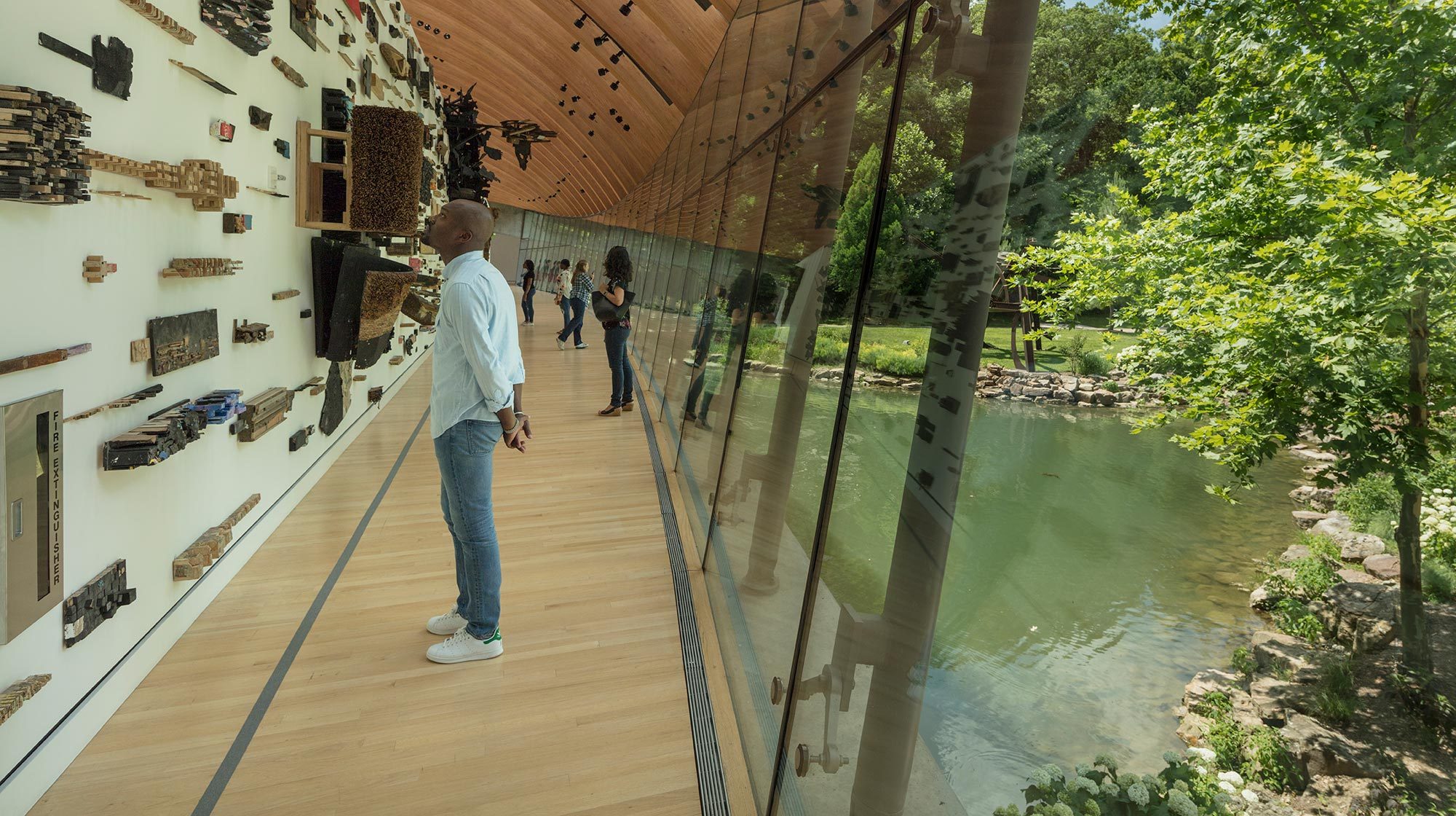 People viewing art in gallery