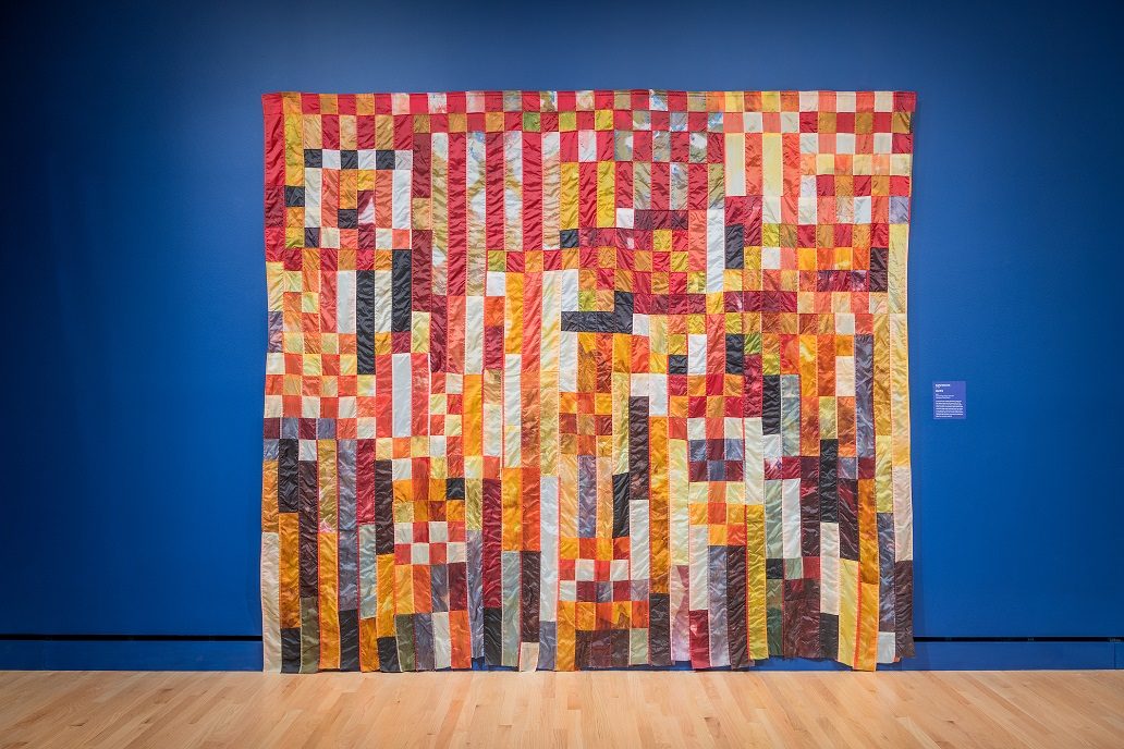 Carla Edwards, Bonfire, 2017, American flags, bleach, and nylon dye, 124 × 112 in. (315 × 284.5 cm), courtesy of Carla Edwards. Photo by Ironside Photography / Stephen Ironside.