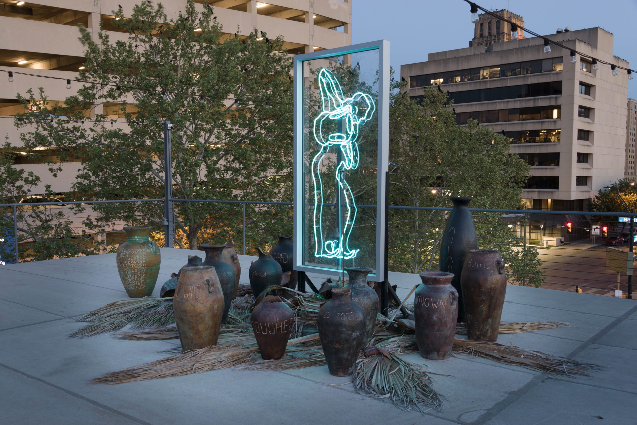 One of the works that will be featured in State of the Art 2020. Sama Alshaibi, The Cessation, 2019, Neon, aluminum, acrylic, copper, palm fronds, terracotta and sound, Dimensions variable, Courtesy of Sama Alshaibi; originally commissioned by Artpace San Antonio, Photo by Seale Photography Studios, ©Artpace San Antonio