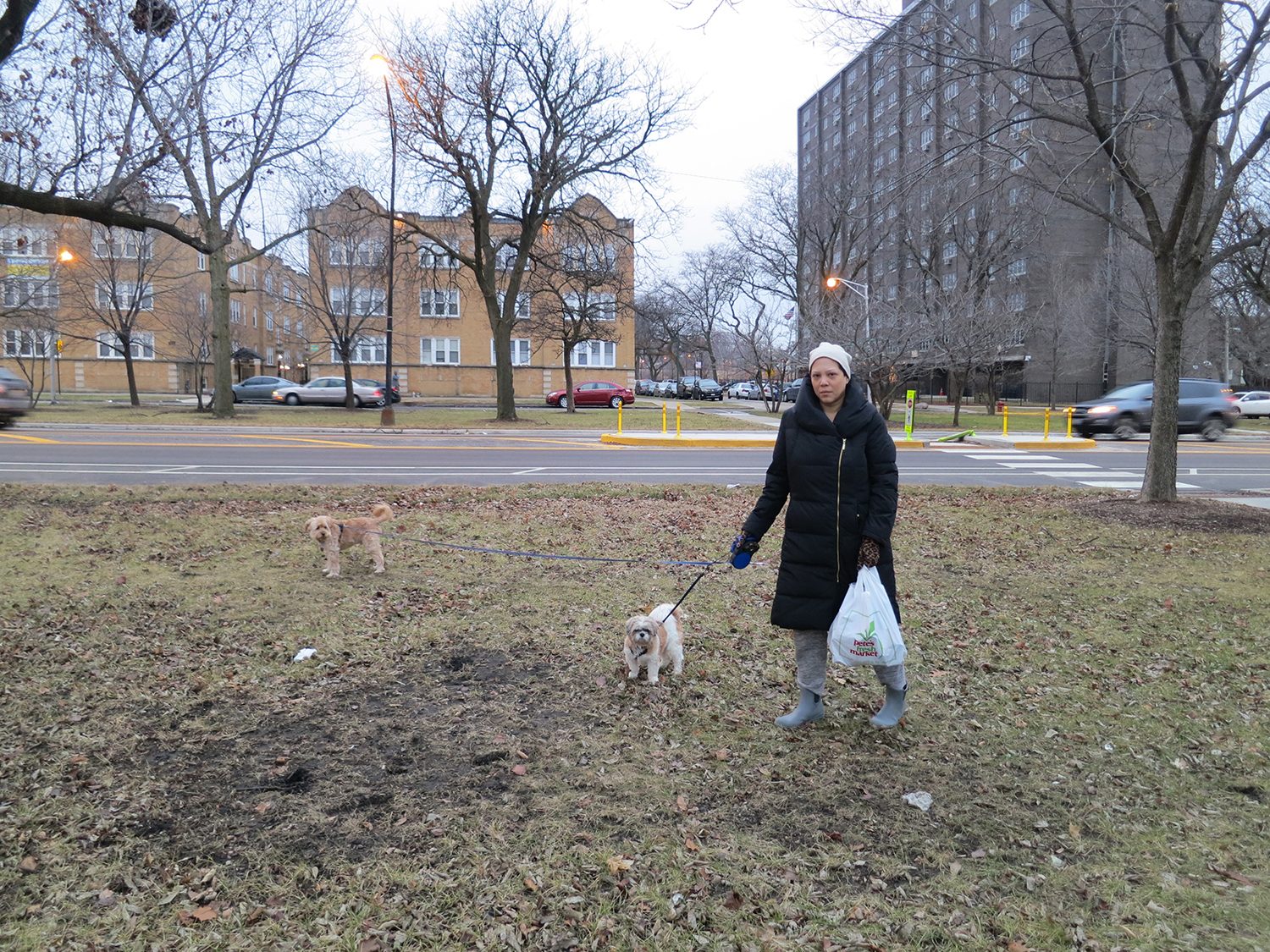 Artist Edra Soto picking up glass bottles near her residence. Photo courtesy of the artist.