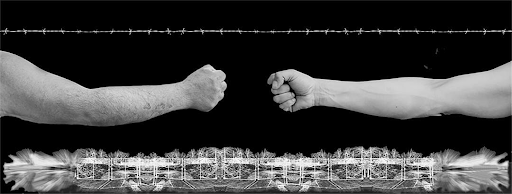 Photographic black and white print where two outstretched arms are clenched in fists over a dark background. Above is a line of barbed wire and below is a border image of power lines, a river and groups of trees.